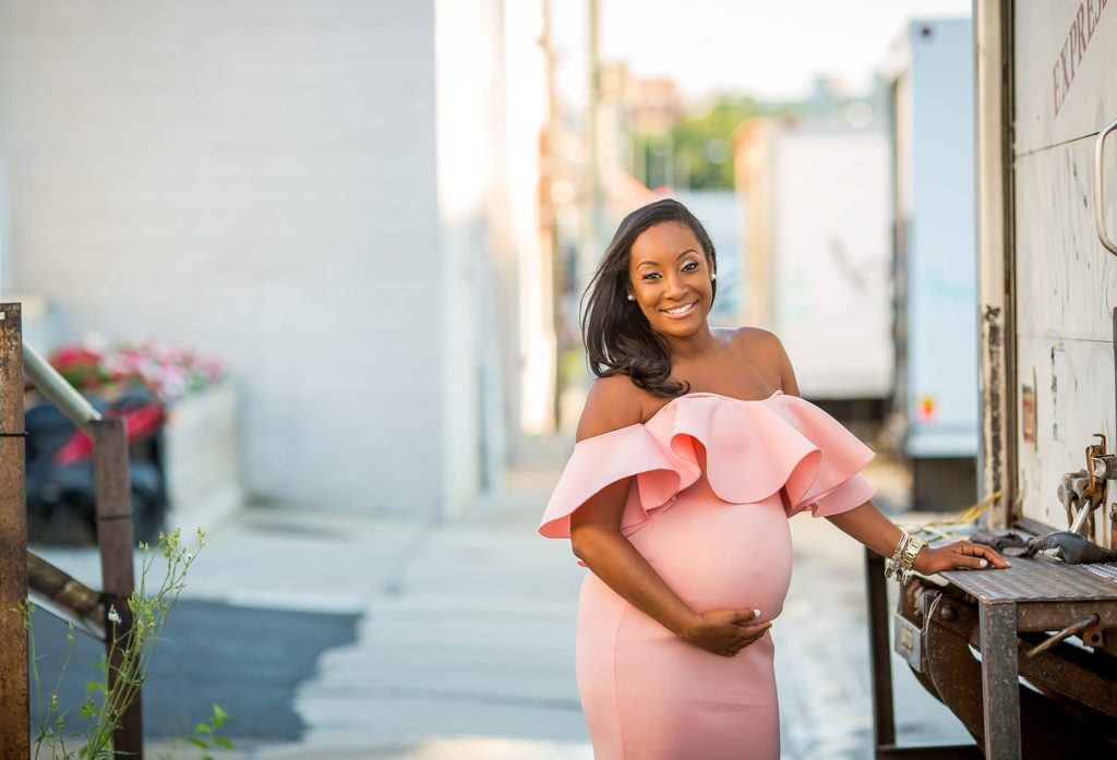 expectant mother in pink dress
